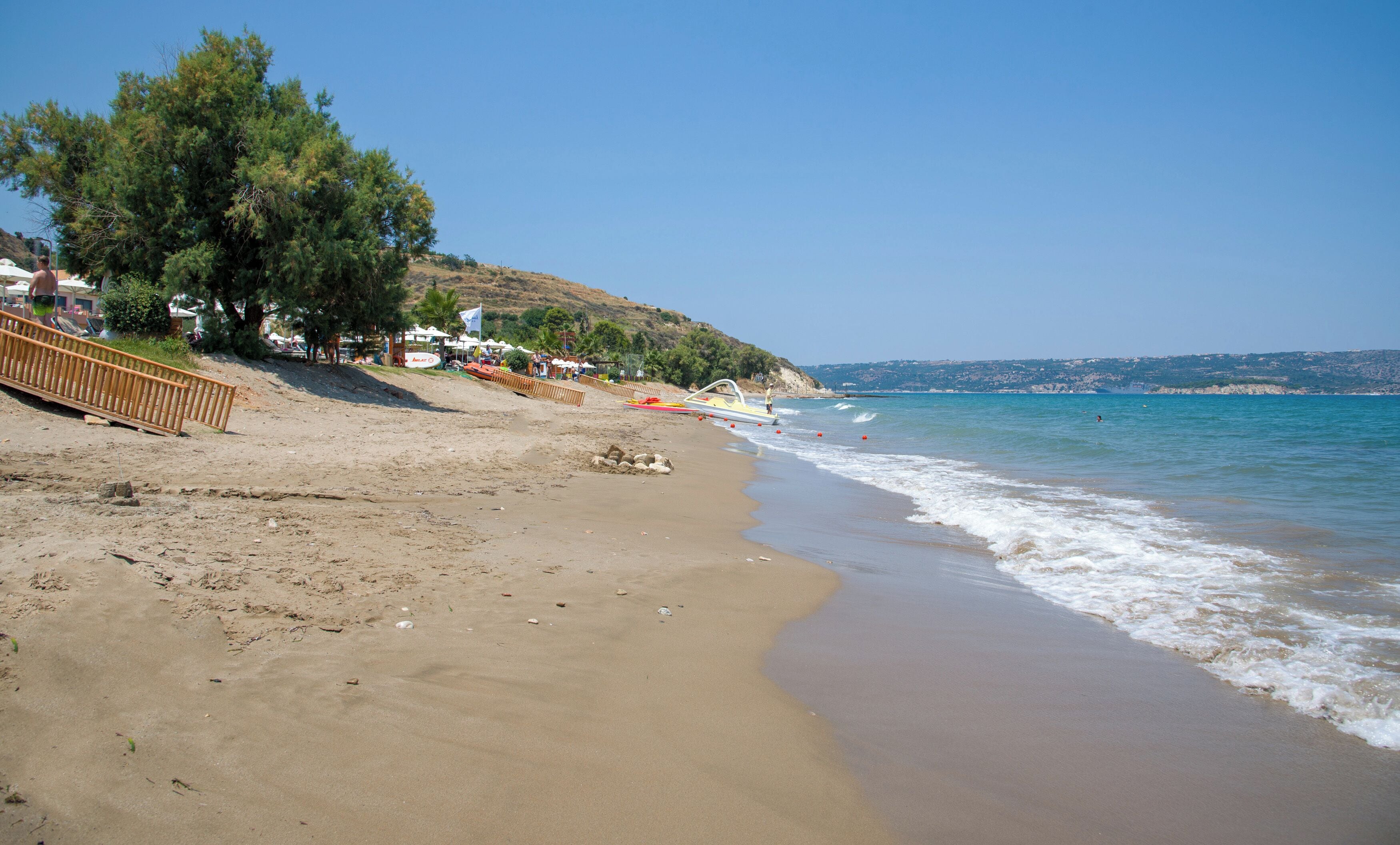 On the beach, sun-loungers, beach umbrellas, beach towels