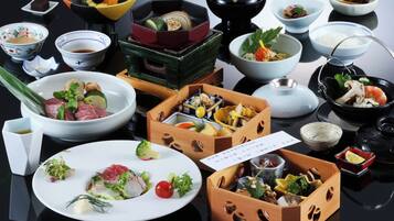 A variety of dishes and bowls on a reflective surface.