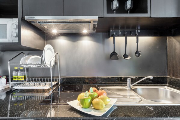 Grand Residence Suite | Private kitchen | Coffee/tea maker, electric kettle, eco-friendly cleaning products