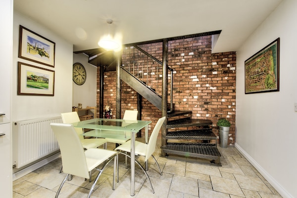 Stylish Stockbridge Apartment | Living area | Flat-screen TV