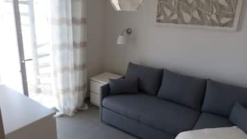 Penthouse, 2 Bedrooms | Living area | Flat-screen TV