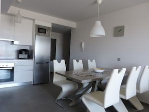 Penthouse, 2 Bedrooms | Private kitchen | Full-size fridge, microwave, oven, stovetop