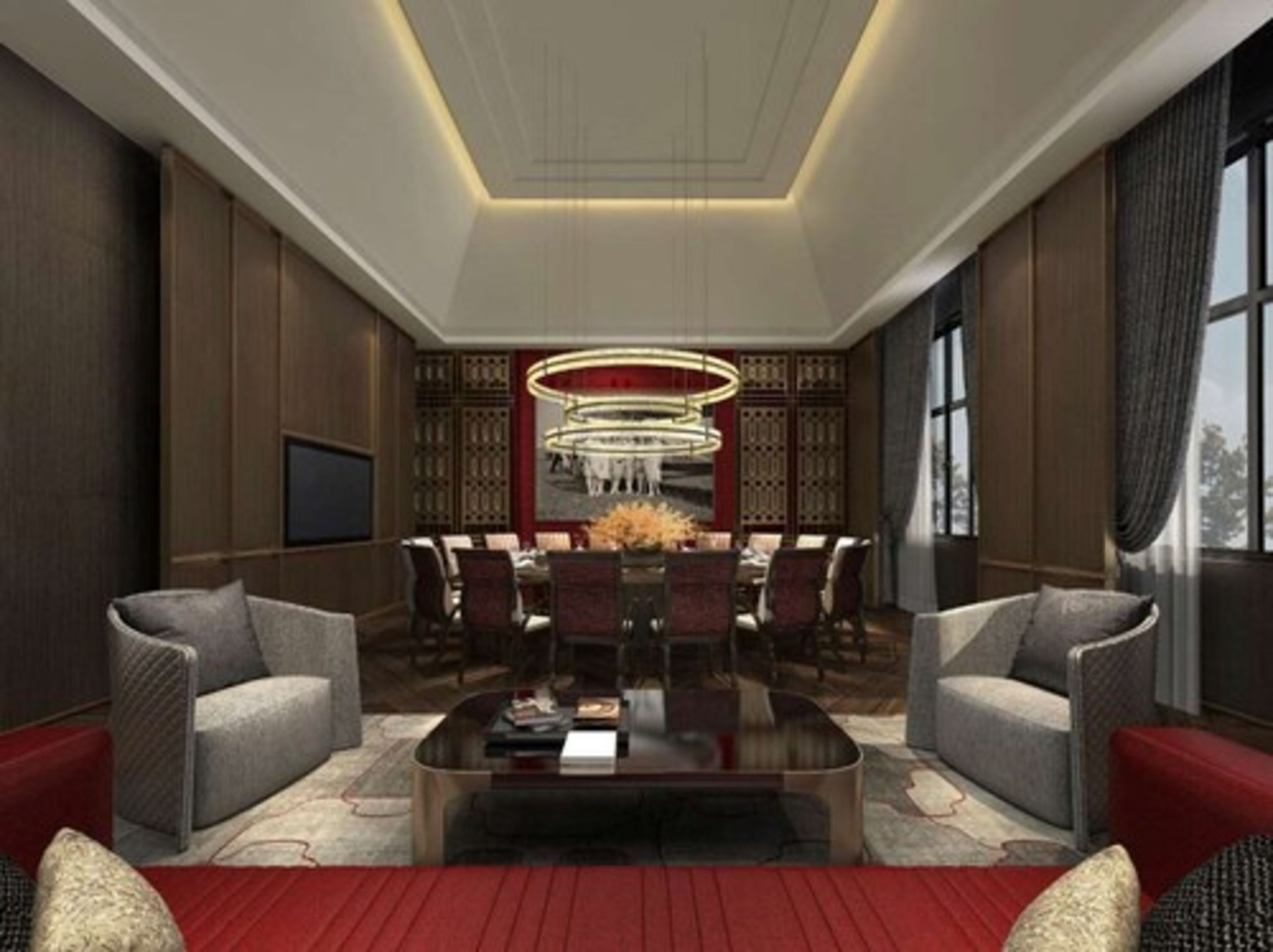 A modern living room with a central dining area, a large chandelier, and a TV mounted on the wall.