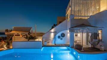 Outdoor pool, open 8:00 AM to 8:00 PM, pool umbrellas, pool loungers