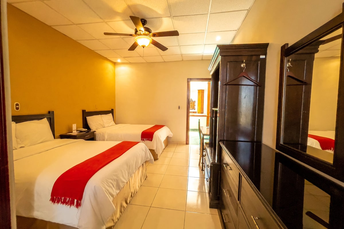 Premium bedding, down duvets, pillow-top beds, laptop workspace