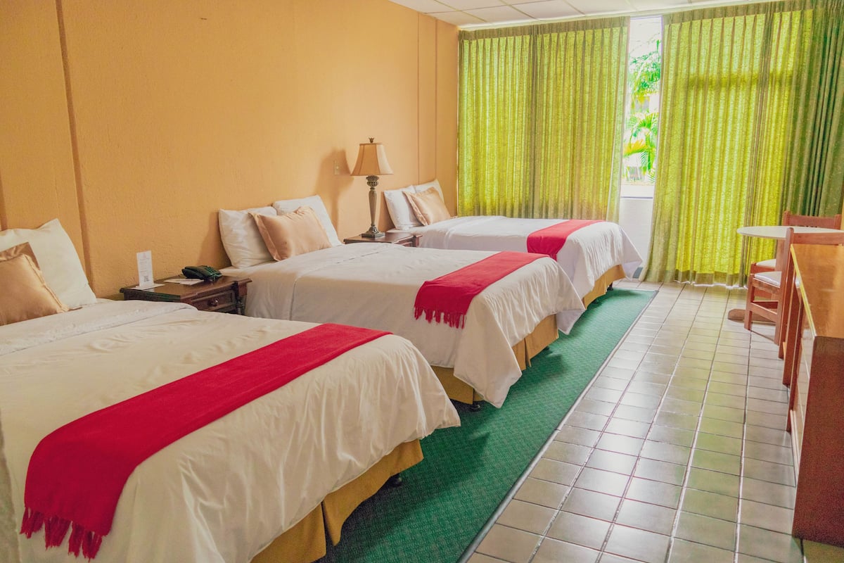 Premium bedding, down duvets, pillow-top beds, laptop workspace