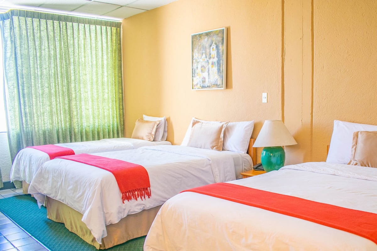 Premium bedding, down duvets, pillow-top beds, laptop workspace