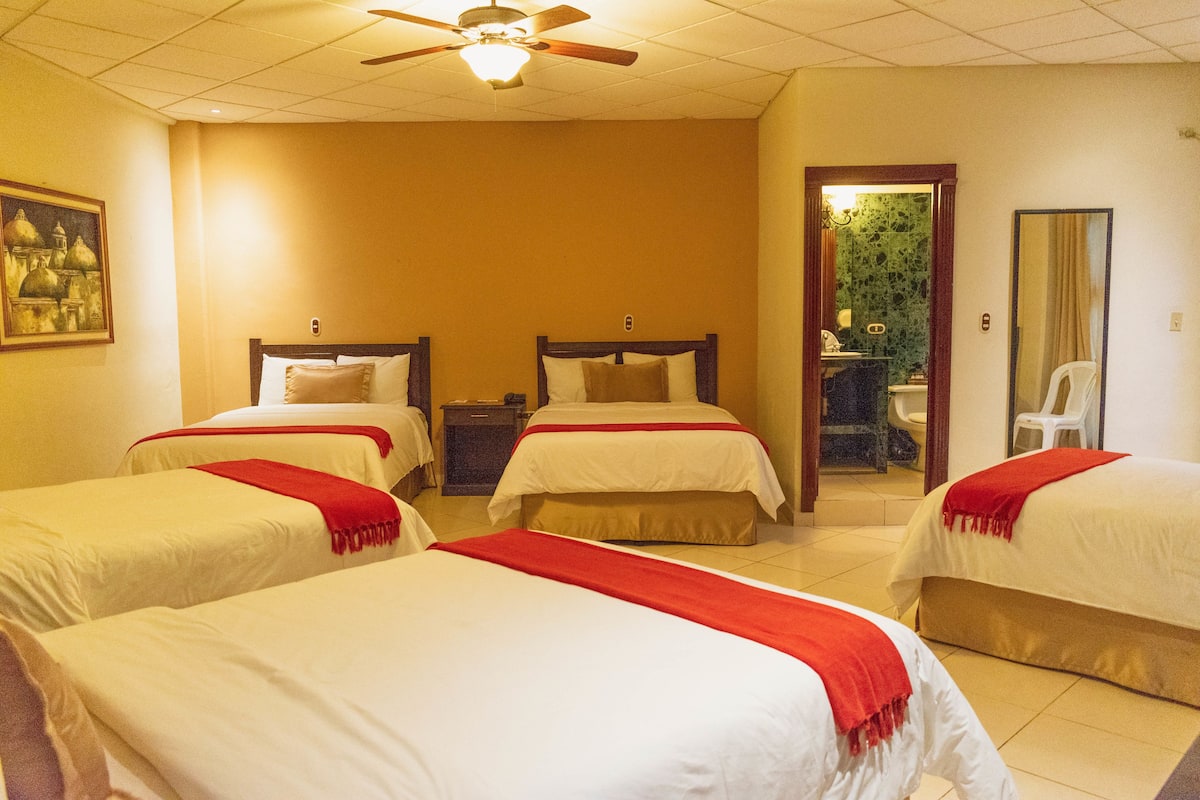 Premium bedding, down duvets, pillow-top beds, laptop workspace