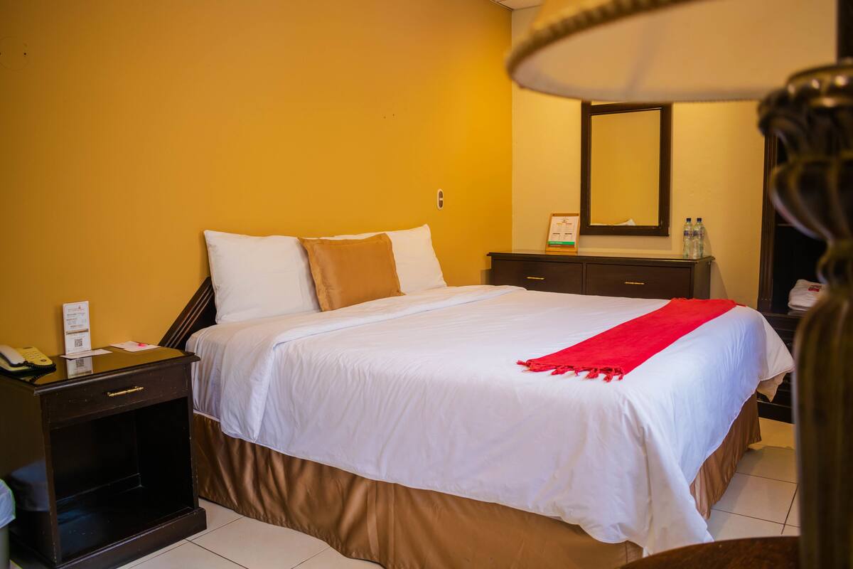 Premium bedding, down duvets, pillow-top beds, laptop workspace