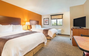 Premium bedding, pillowtop beds, desk, laptop workspace