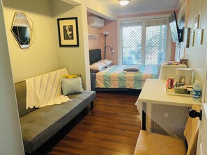 Economy Double Room, 1 Queen Bed | Individually decorated, individually furnished, desk, laptop workspace - Lily's Garden (Charlottetown)