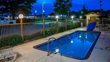 Seasonal outdoor pool, open 9:00 AM to 9:00 PM, pool loungers