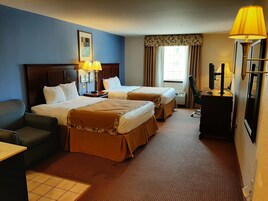 Desk, laptop workspace, blackout drapes, iron/ironing board