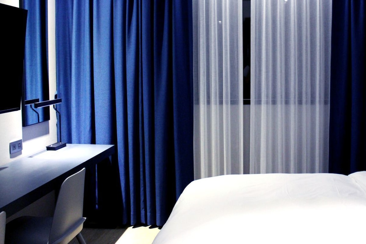 Couette en duvet d'oie, coffres-forts dans les chambres, bureau