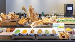 A buffet with various food items and a sign indicating fermentation vegetables. - Hotel Keihan Kyotoeki Minami (Kyoto)