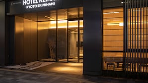 A modern hotel entrance with a sign reading "HOTEL KEIHAN KYOTO EKIINAMI". - Hotel Keihan Kyotoeki Minami (Kyoto)