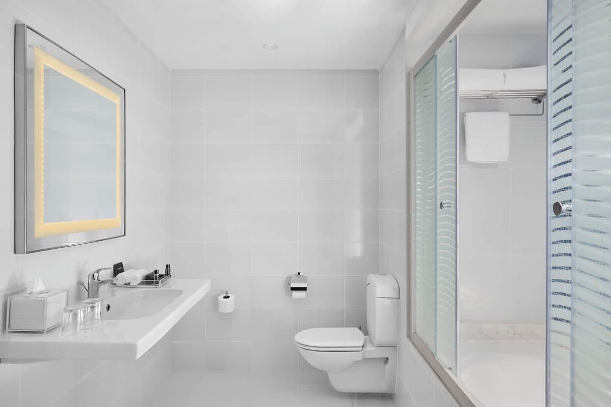 hair dryer, bathrobes, slippers, towels