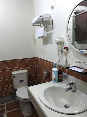 Shower, free toiletries, hair dryer, slippers