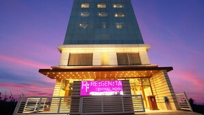 A hotel building with a sign reading "RE:GEN:TA CENTRAL, NOIDA BY ROYAL ORCHID HOTELS LTD." - Regenta Central Noida (Noida)