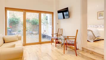 Apartment, 2 Bedrooms | Living area | Flat-screen TV