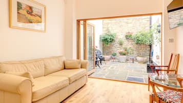 Apartment, 2 Bedrooms | Living area | Flat-screen TV