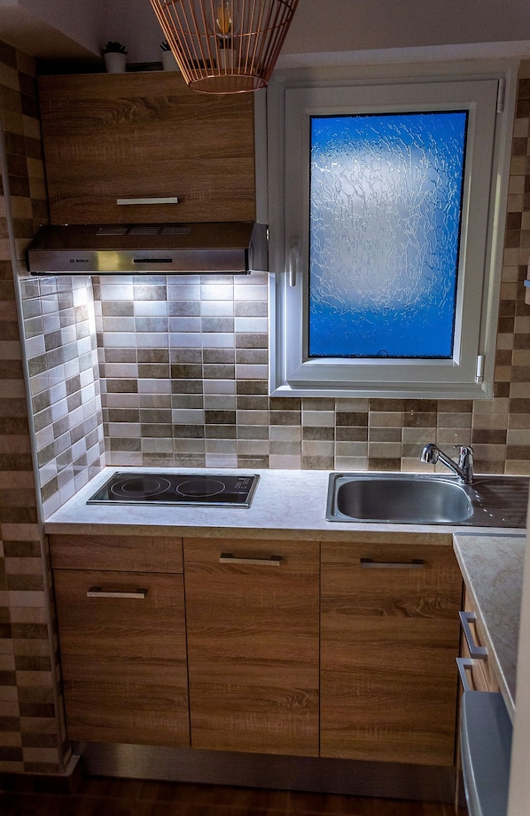 Apartamento, balcón (2) | Cocina privada | Frigorífico, microondas, horno y placa de cocina