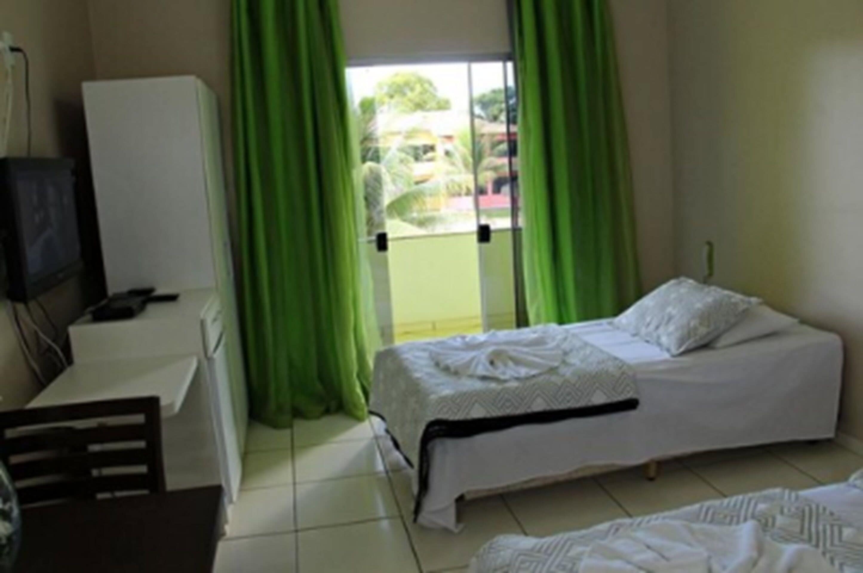 double or twin room | minibar, desk, bed sheets