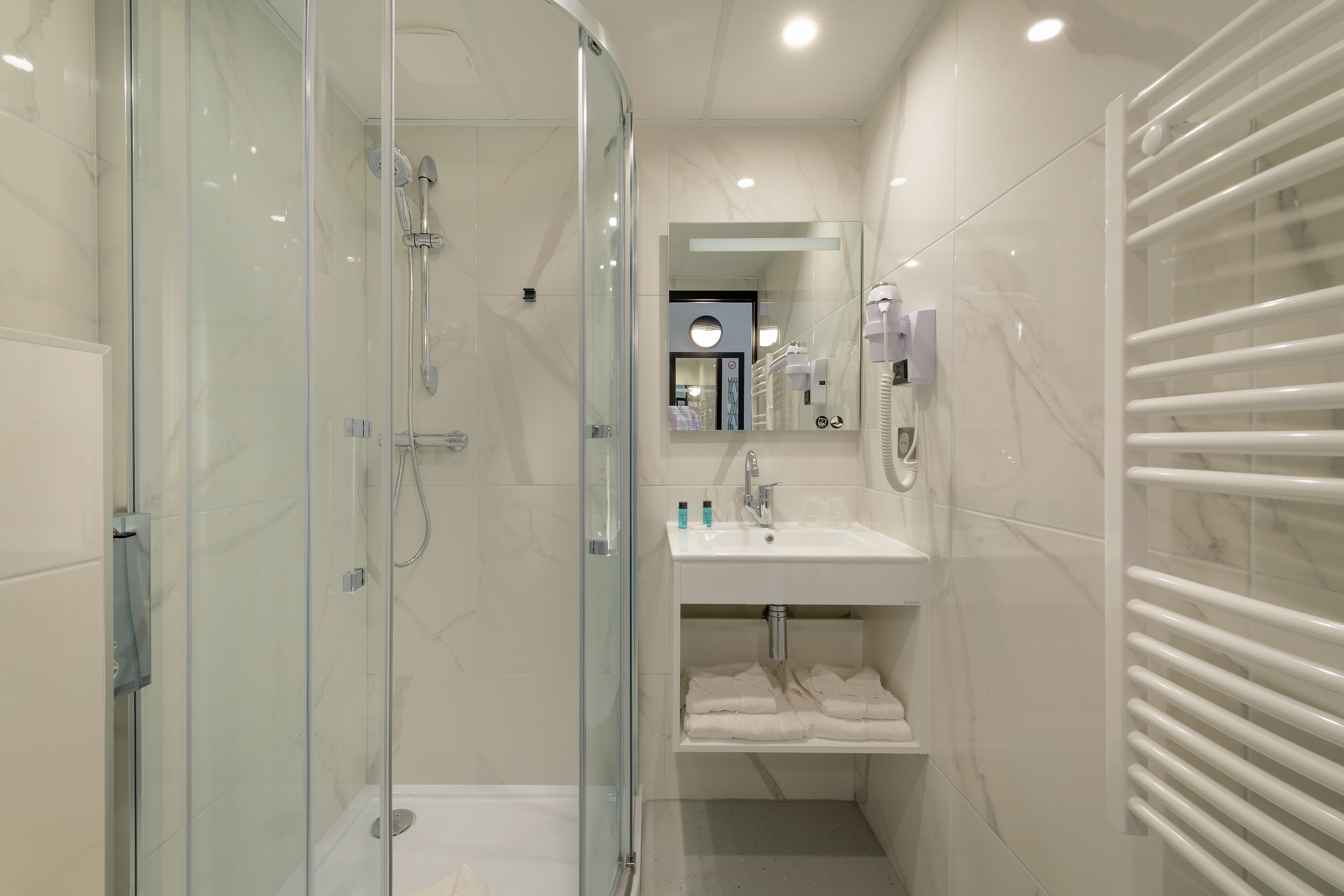 hair dryer, towels, soap, shampoo