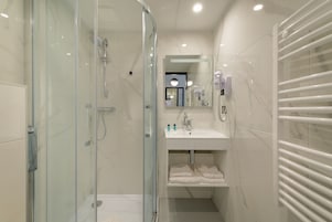 Hair dryer, towels, soap, shampoo