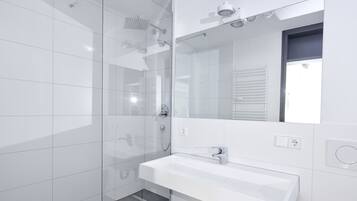 Standard Studio | Bathroom | Shower, hair dryer, towels, soap