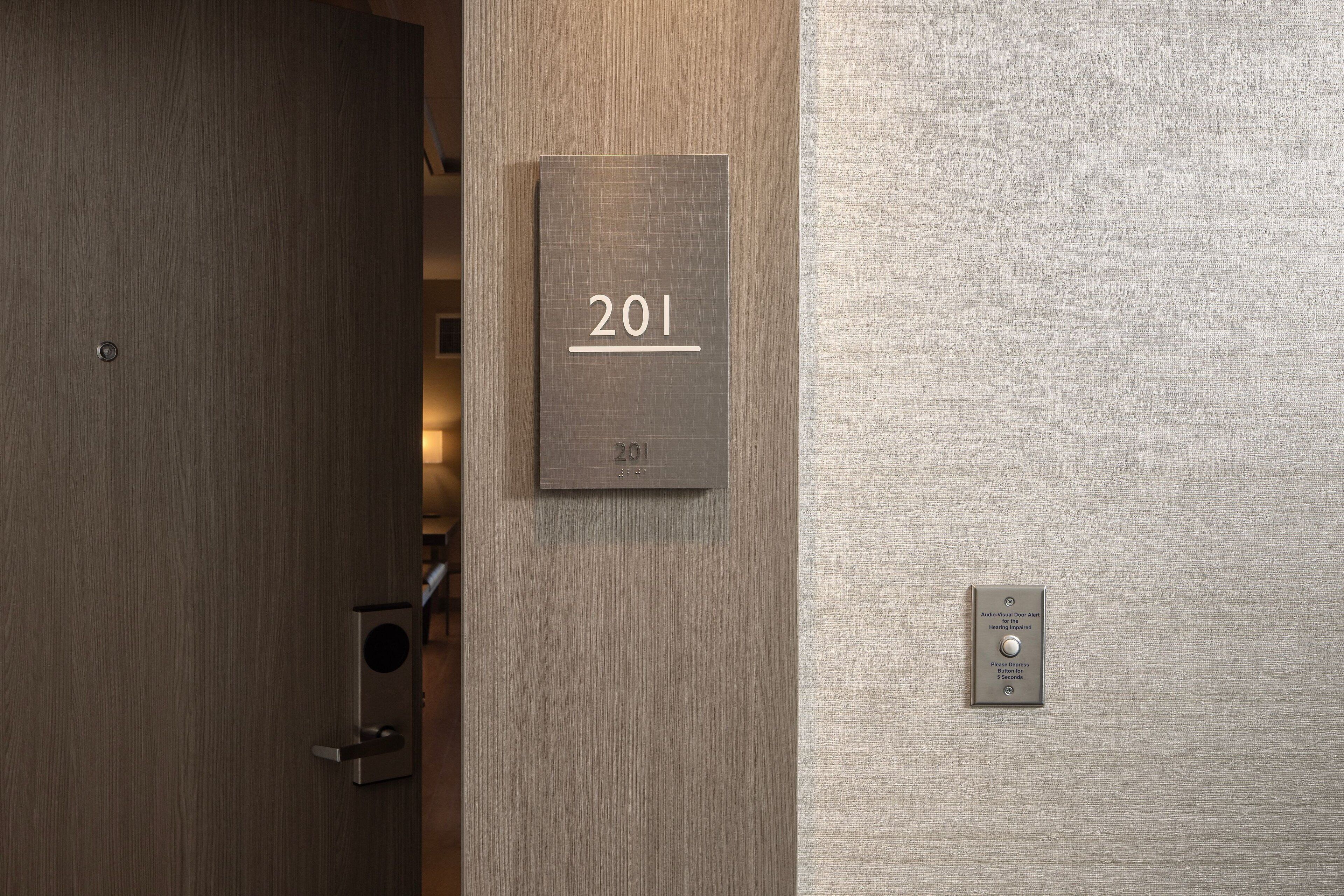 premium bedding, pillow-top beds, desk, laptop workspace