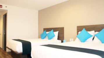 Tabla de planchar con plancha, wifi gratis y ropa de cama
