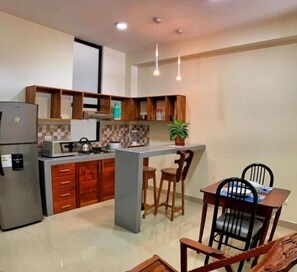 Deluxe Studio | Living area | Smart TV, heated floors - Studio 69 (Iquitos)