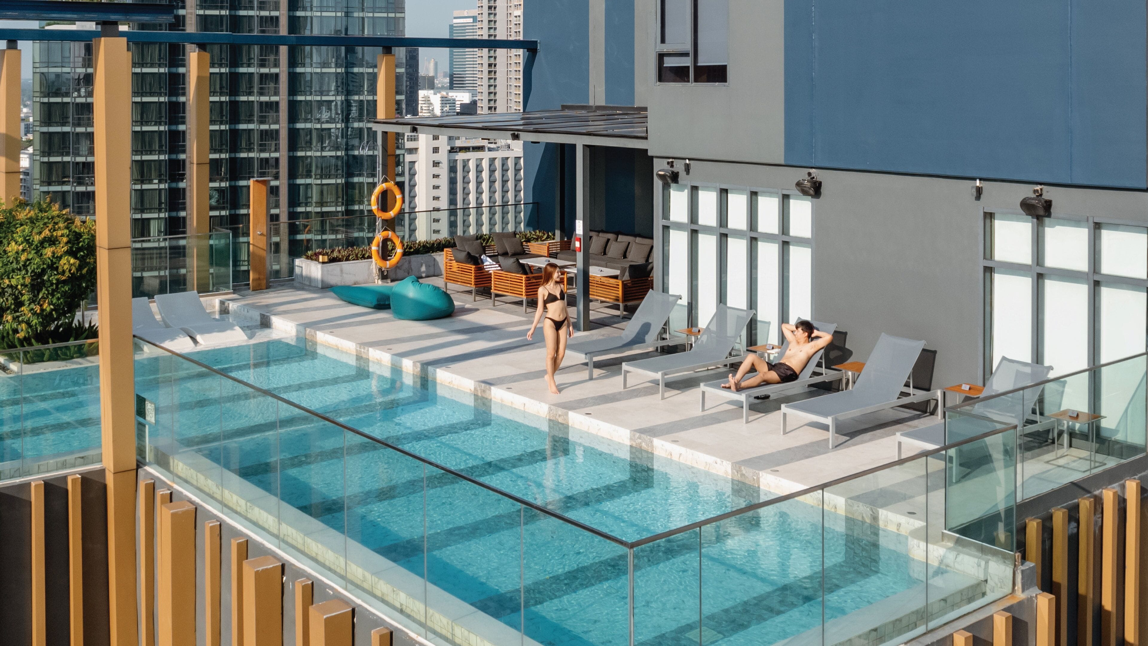 outdoor pool, pool umbrellas, pool loungers