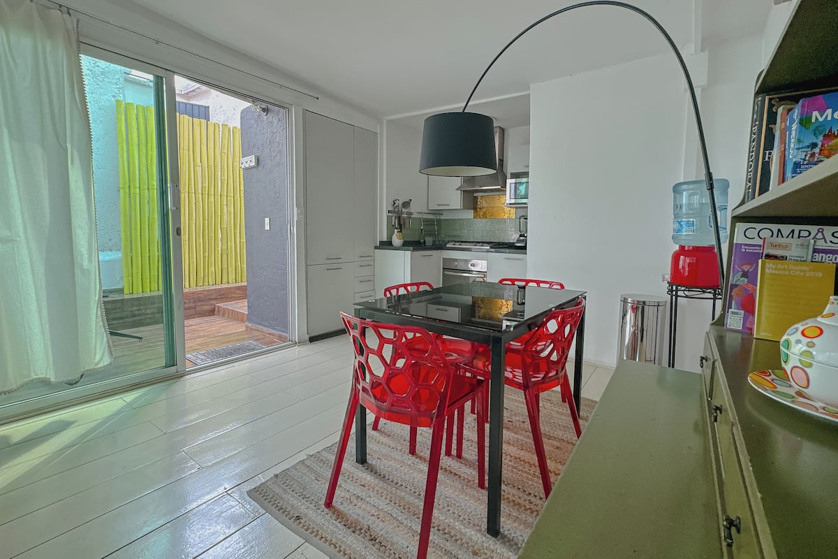 Panoramic Apartment | Private kitchen | Coffee/tea maker, full-size fridge, oven, stovetop