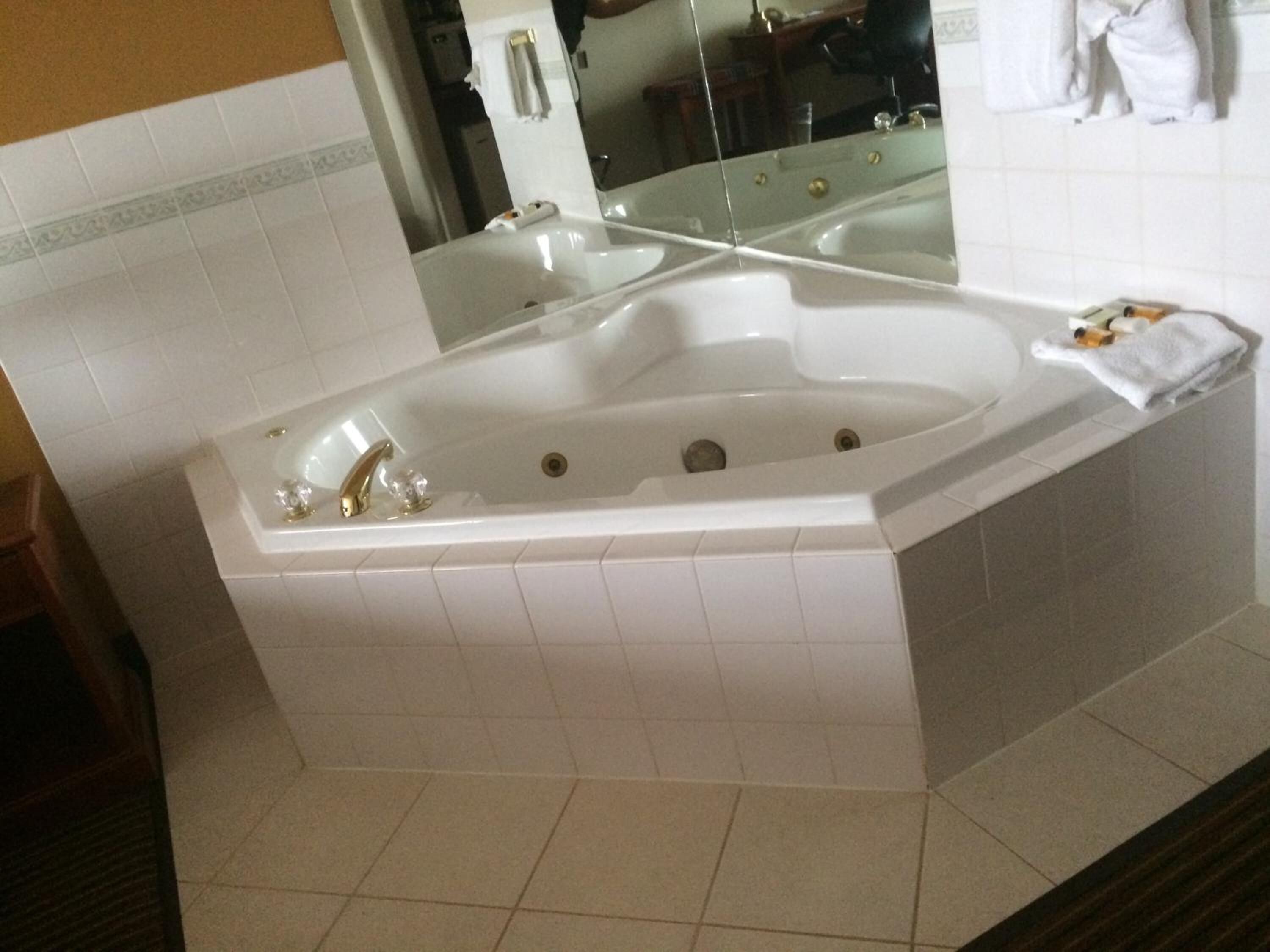 deep-soaking bathtub, free toiletries, hair dryer, towels