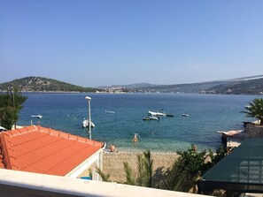 On the beach, sun-loungers - Seafront apartment in Ražanj, Rogoznica A2 (Ražanj-Rogoznica)