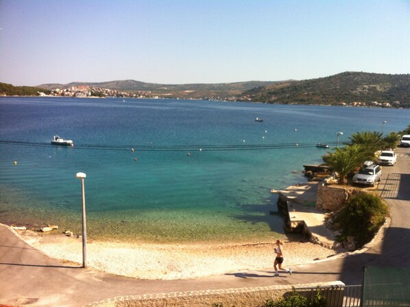 On the beach, sun loungers