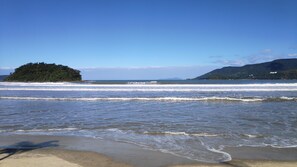 On the beach, sun-loungers