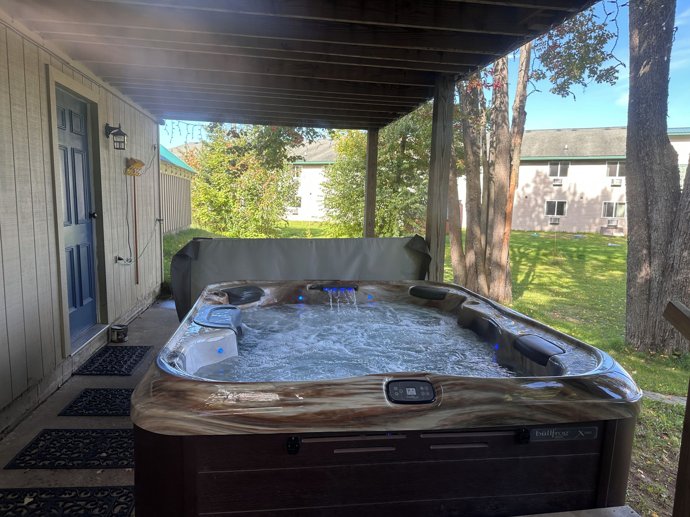 New hot tub with covered deck above. Also has Christmas lights you can plug in around the deck.