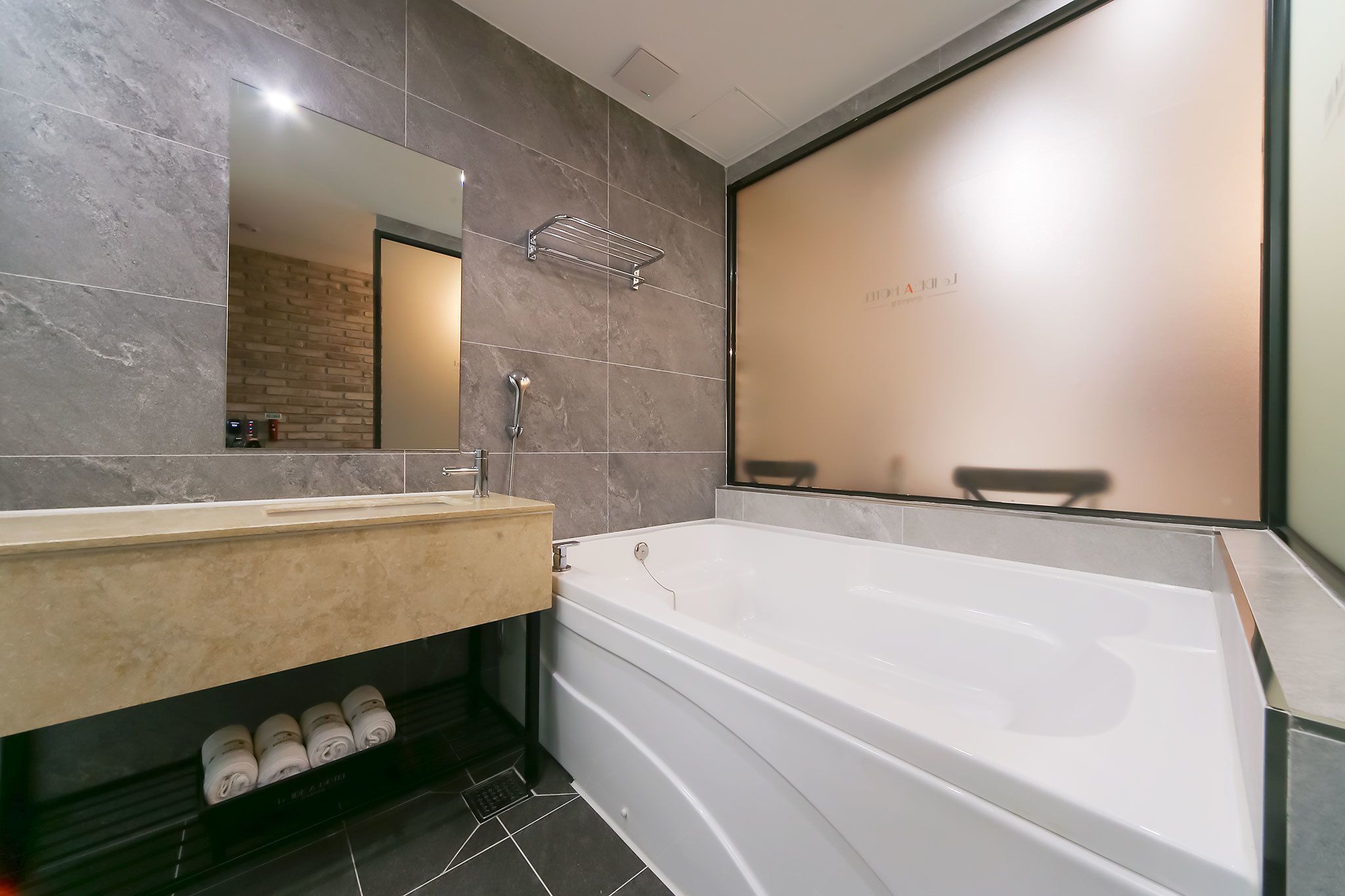 Combined shower/bathtub, free toiletries, hair dryer, bathrobes