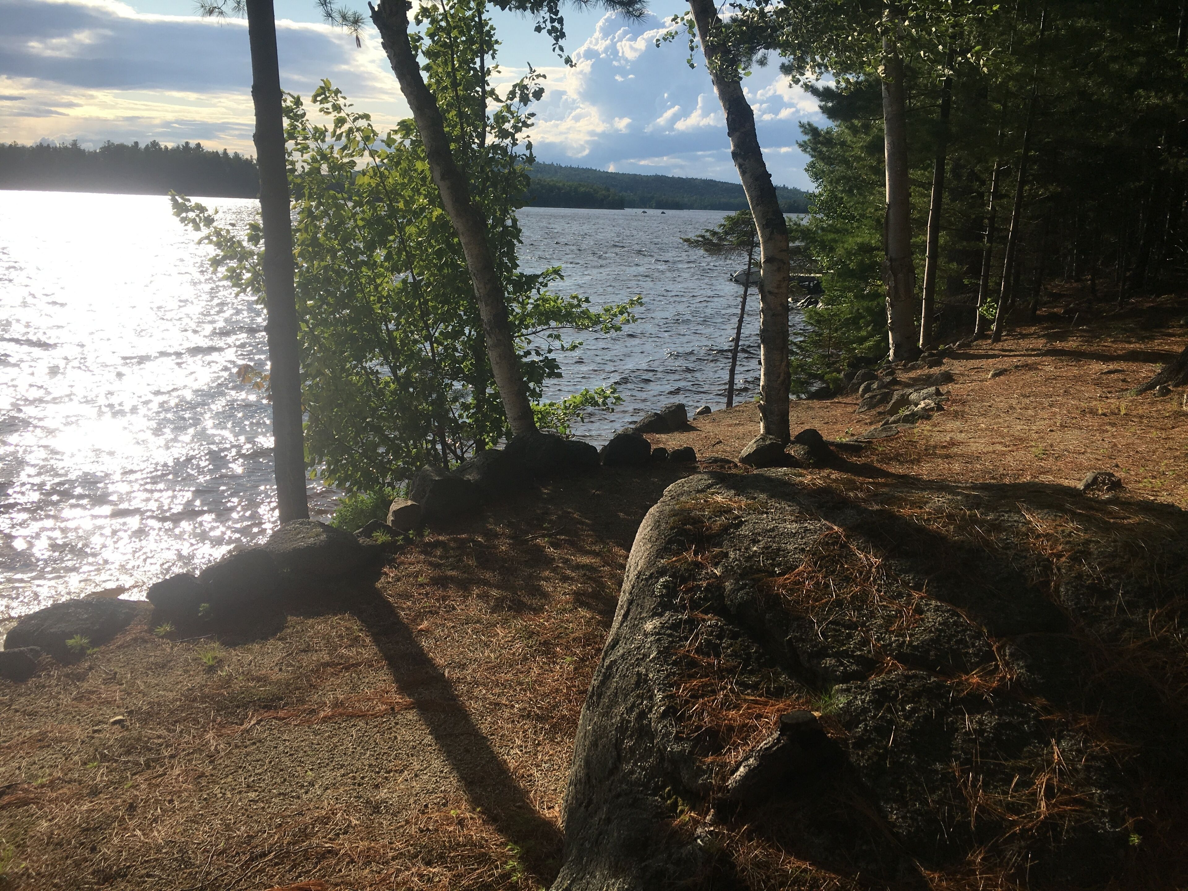 Rustic Cabin on Ambajejus Lake With Sandy Beach and a Mountain View