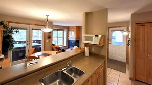 Condo, 1 Bedroom | Private kitchen | Fridge, microwave, stovetop, dishwasher