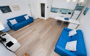 Apartment, 1 Bedroom, Sea View | Living area | 40-inch TV with cable channels - Apartment Al Porto (Rovinj)