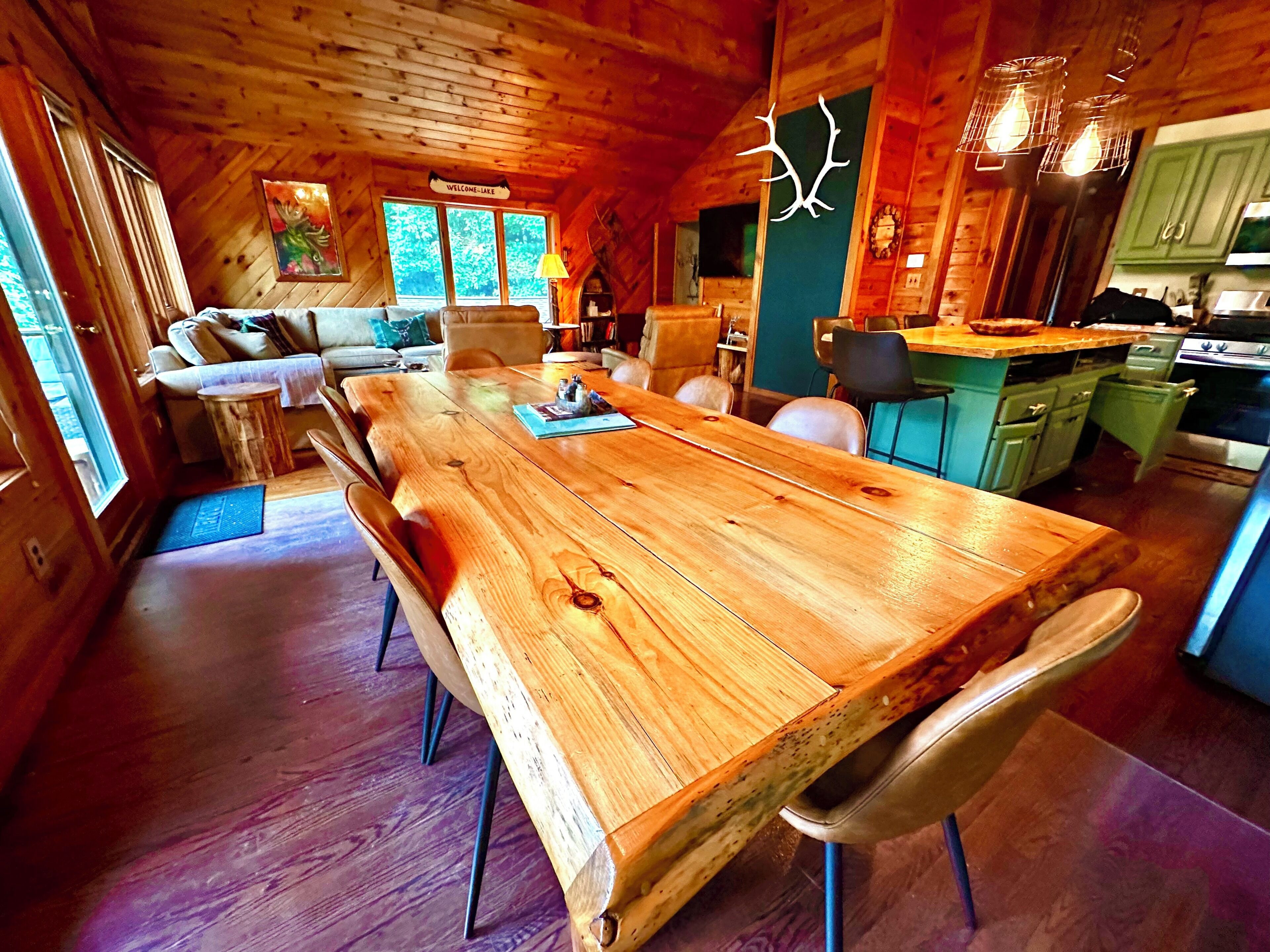 Beautiful custom ADK dining table that easily seats 8. Island seats 4.