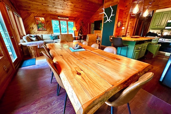 Beautiful custom ADK dining table that easily seats 8. Island seats 4.