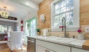 Combined shower/tub, hair dryer, towels, soap