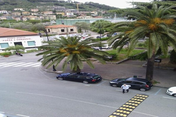 A street view with a building labeled 'Società Sportiva Forza e Coraggio'.