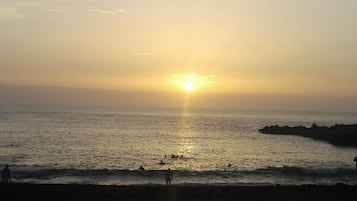 On the beach, beach towels