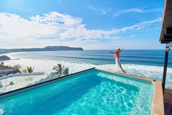 2 piscinas al aire libre, sillones reclinables de piscina